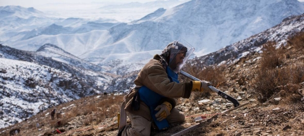 An explosives specialist conducts mine clearance operations after detecting a piece of metal in Afghanistan, where 2,300 casualties as a result of landmines were reported in 2017 alone. — Courtesy file photo