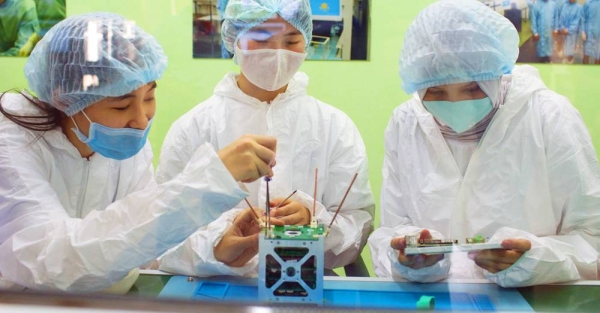 Young women participate in Kazakhstan’s first nanosatellite development program aimed at women. —courtesy UNICEF/Zhanara Karimova