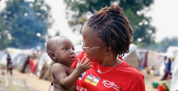 Central African reporter Merveille Noella Mada-Yayoro reporting on conditions at Birao IDP camp. for Guira FM, the UN peace mission's radio in CAR. — courtesy MINUSCA