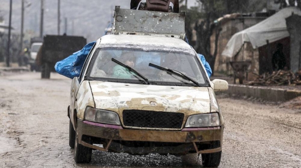 File photo shows a family arriving in Afrin in northern Aleppo governorate in Syria after escaping conflict in rural Idlib. — courtesy UNICEF/Ashawi