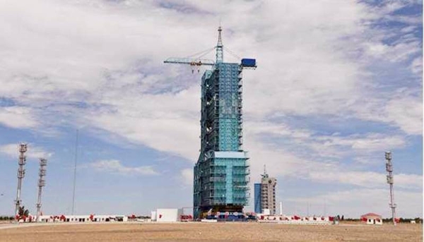 

A Long March-2F carrier rocket, carrying the Shenzhou-12 spacecraft for China's first crewed mission to its new space station, scheduled for June 17, sits on the launch pad encased in a shield at the Jiuquan Satellite Launch Centre in the Gobi desert in northwest China.