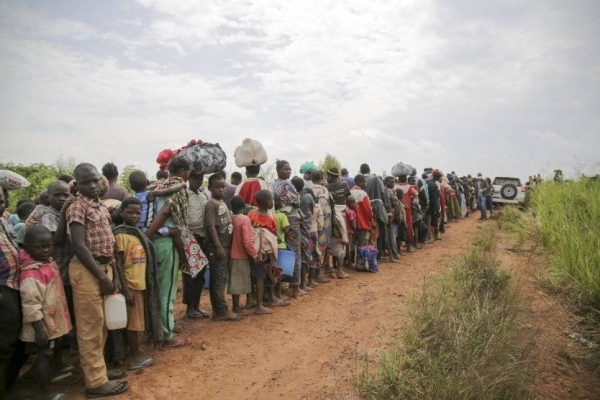 Congolese asylum-seekers await health screening in Zombo, near the border between Uganda and the Democratic Republic of Congo, in July 2020. — Courtesy file photo