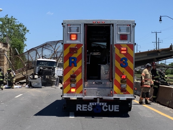 A pedestrian bridge that likely was struck by at least one vehicle collapsed onto Interstate 295 in Washington, DC, injuring several people and blocking the highway in both directions, officials said on Wednesday. — Courtesy photos