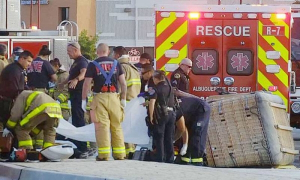 A hot air balloon crashed in an Albuquerque, New Mexico, neighborhood on Saturday, killing five people after apparently being blown into power lines by the wind and catching fire, police said.