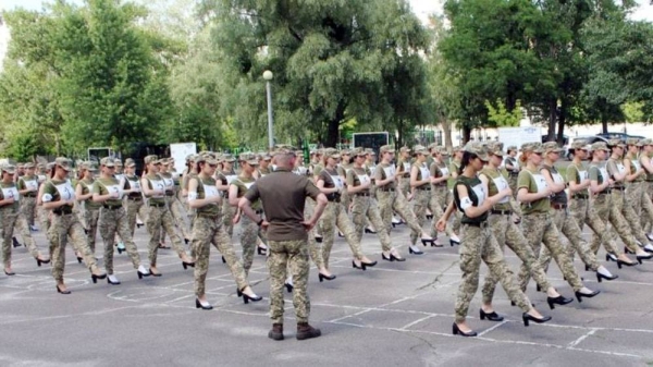 The female students of a military college are seen wearing military fatigues and black-heeled shoes during a practice drill. — courtesy Ukraine MOD