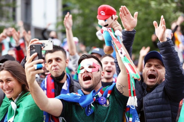 Italy's Federico Chiesa celebrates his side's first goal after he curled a beautiful strike into the far corner of Unai Simon's net.