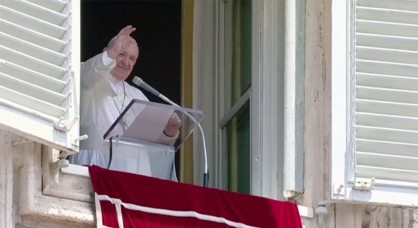 In this videograb, Pope Francis arrives for his weekly general audience with a limited number of faithful in the San Damaso Courtyard at the Vatican.