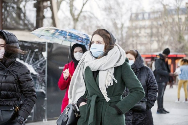 File photo of Belgians taking precautions during the onset of coronavirus. Belgian scientists on Sunday reported that an elderly woman had died from COVID-19 after being infected with the Alpha and Beta variants at the same time.