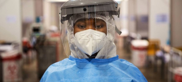 A volunteer carer called Trinity is working in a COVID-19 field hospital in Nasrec, Johannesburg, in this courtesy file photo

