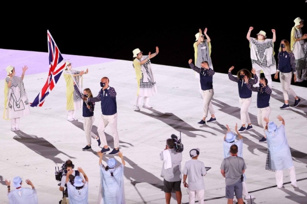  The gold medal-winning rower Mohamed Sbihi made history on Friday, becoming the first Muslim to carry the British flag at an Olympic opening ceremony. He was joined by another gold medalist, the sailor Hannah Mills. — Courtesy photo