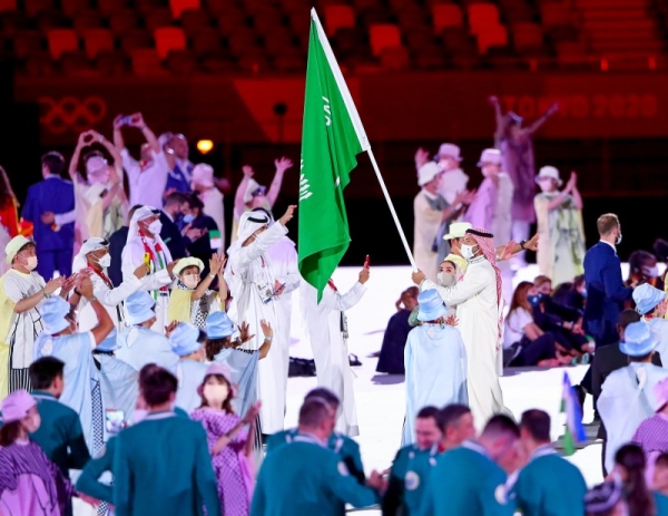 Saudi rower Hussein Alireza and the Saudi female sprinter Yasmine Al-Dabbagh carried Saudi Arabia’s flag at the opening ceremony of the Olympic Games Tokyo 2020 on Friday.