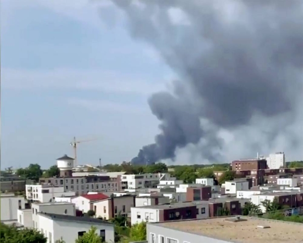 A videograb shows smoke billowing following an explosion at a chemical park in the German city of Leverkusen on Tuesday.