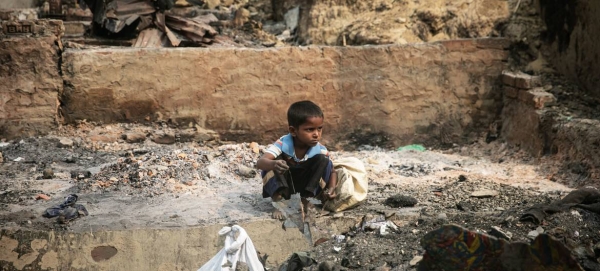 A child rummages through debris after a massive fire devastated the Balukhali area of the Rohingya refugee camps in Cox’s Bazar, Banglades, in this file courtesy picture. 