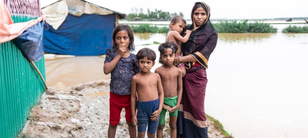 A child rummages through debris after a massive fire devastated the Balukhali area of the Rohingya refugee camps in Cox’s Bazar, Banglades, in this file courtesy picture. 