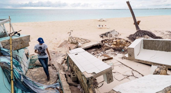 With most of its land only a few feet above sea level, Kiribati is seeing growing damage from storms and flooding. — courtesy NICEF/Vlad Sokhin