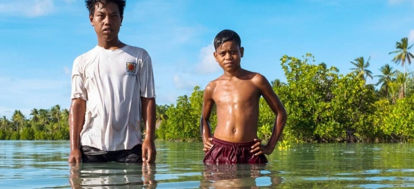 With most of its land only a few feet above sea level, Kiribati is seeing growing damage from storms and flooding. — courtesy NICEF/Vlad Sokhin