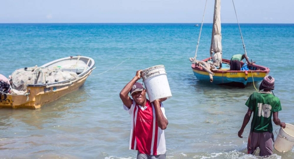 With most of its land only a few feet above sea level, Kiribati is seeing growing damage from storms and flooding. — courtesy NICEF/Vlad Sokhin