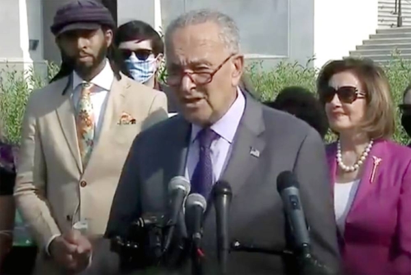 Senate Democratic leader Chuck Schumer makes a point on the $1 trillion infrastructure bill.