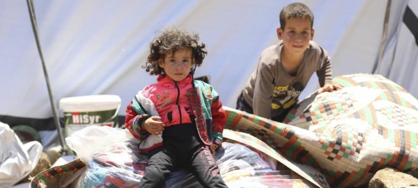 Families fleeing escalating violence in Deraa set up tents on the southwestern borders of Syria. — Courtesy file photo