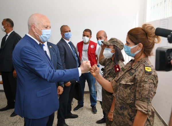 Tunisian President Kais Saied visits the Rades vaccination center at the Farhat Hached Institute to follow up on the first day of the intensive COVID19 nationwide vaccination campaign. (@TnPresidency)
