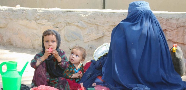 A mother and her children fled conflict in Lashkargah and now live in a displaced persons camp in Kandahar, southern Afghanistan. — courtesy UNICEF Afghanistan