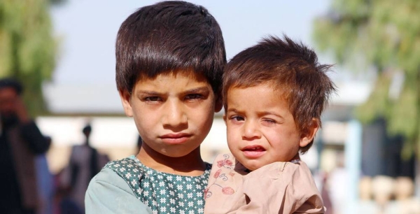 A mother and her children fled conflict in Lashkargah and now live in a displaced persons camp in Kandahar, southern Afghanistan. — courtesy UNICEF Afghanistan