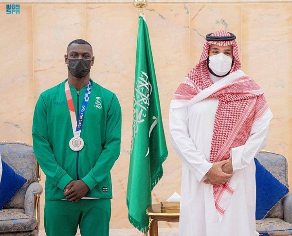  Crown Prince Muhammad Bin Salman, deputy premier and minister of defense, met on Tuesday with Saudi karate champion Tariq Hamdi, who won the silver medal for the Kingdom in the recently concluded Tokyo 2020 Olympics.