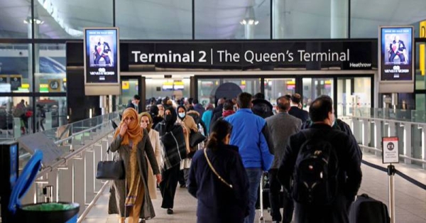 View of a sign saying Welcome to Heathrow in a tunnel at London Heathrow Airport (LHR) in London.