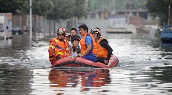 Rescue efforts in central China following heavy rains on Thursday and Friday.