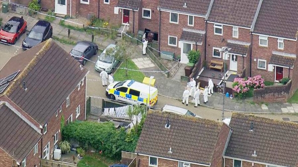 Investigators at the scene of the shooting. — courtesy SKY