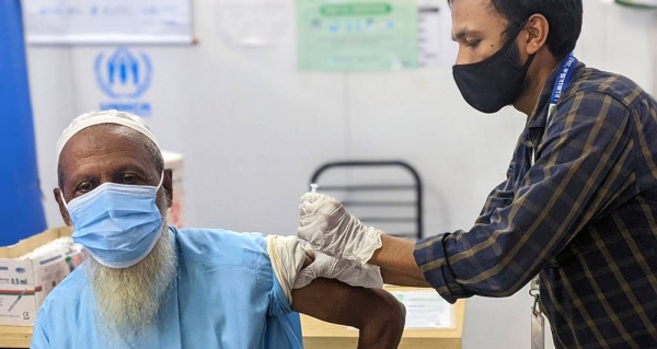 A Rohingya refugee is vaccinated against COVID-19 in Bangladesh. Low-income countries have only vaccinated around two percent of their populations. — courtesy UNHCR