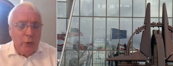 NATO's former Deputy Assistant Secretary-General Jamie Shea, left, with a picture of the alliance on right.