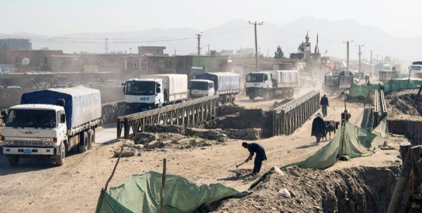 Trucks from the UN's World Food Program leave Kabul in May 2021 to deliver food to vulnerable communities. — courtesy WFP/Arete/Andrew Quilty