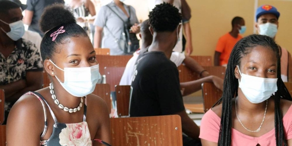 
Two young women wait to be vaccinated in Cabo Verde. — courtesy UN Cabo Verde