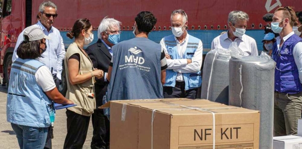 The UN humanitarian chief, Martin Griffiths, visits the Transhipment Hub near the Bab al-Hawa crossing on the Syria-Turkey border. — courtesy OCHA