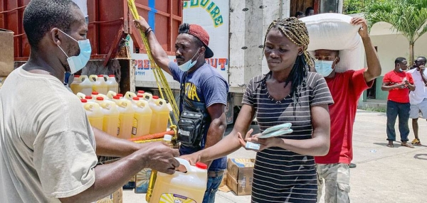 Food is distributed to 3,000 people in Camp Perrin, one of the areas in the south of Haiti that was affected by the earthquake. — courtesy WFP/Marianela González