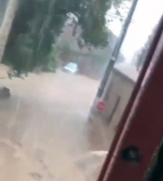 Videograb of flash floods turning into roads into rivers as heavy rains lash southern France Wednesday.