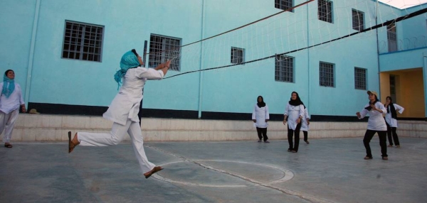 Girls play volleyball at a school in Herat, Afghanistan, in 2016. — courtesy UNAMA