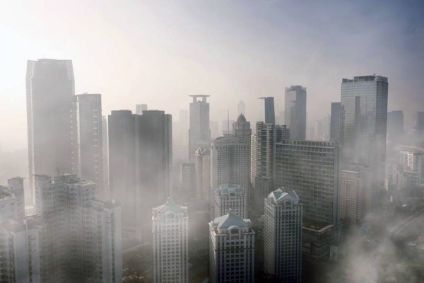 File photo of an aerial view of severe air pollution with skyscrapers in Jakarta city on April 24, 2019. — courtesy photo