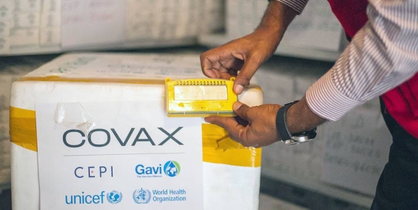 A woman is vaccinated against COVID-19 at a health post in Nepal's remote Darchula District. — courtesy UNICEF/Laxmi Prasad Ngakhusi