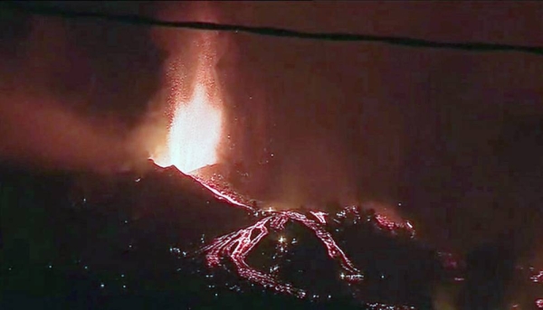 Several small earthquakes shook the Spanish island of La Palma off northwest Africa, keeping nerves on edge as rivers of volcanic lava continued to flow toward the sea on Tuesday and a new vent blew open on the mountainside.