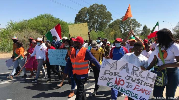 Protesters led by the opposition and traditional leaders march through the capital Windhoek.