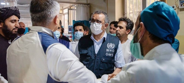 WHO Director-General Tedros Adhanom Ghebreyesus (center) speaks to hospital staff at the Wazir Mohammad Akbar Khan National Hospital in Kabul, Afghanistan. — courtesy WHO/Lindsay Mackenzie