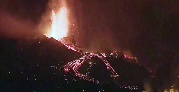 Lava from a volcano eruption flows on the island of La Palma in the Canaries, Spain on Tuesday