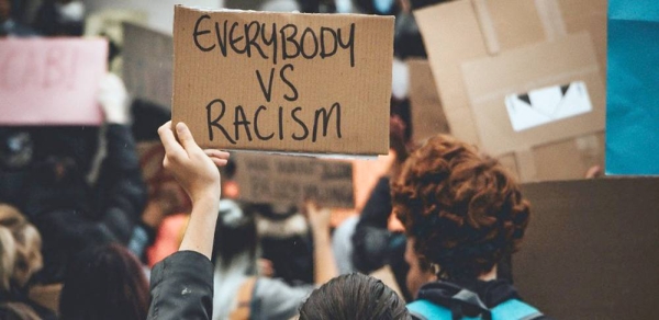 Protestors take part in a Black Lives Matter demonstration in the UK. — courtesy Unsplash/Arthur Edelmans