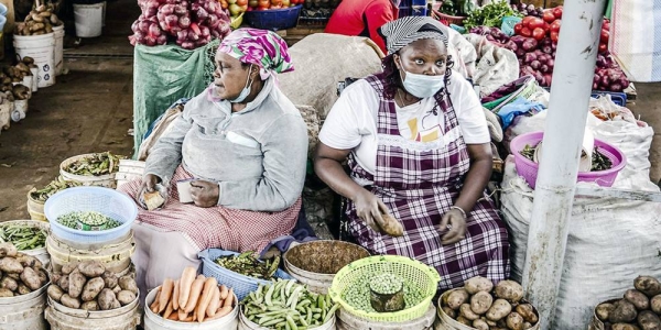 Women vendors sell fresh vegetables at a market in Limuru, Kenya. — courtesy FAO/Luis Tato