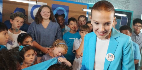 UNICEF Goodwill Ambassador Angelique Kidjo engages with children in the Housh el Refka informal settlement, in Lebanon's Bekaa Valley. — courtesy UNICEF/Diego Ibarra Sanchez