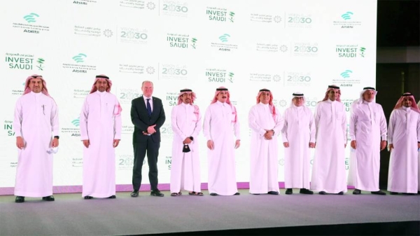 Eng. Suliman Bin Khalid Almazroua, CEO of NIDLP, and Eng. Ali Alhazmi, CEO of ABHGA. sign the cooperation agreement between the National Industrial Development and Logistics Program (NIDLP) and Ajlan & Bros Holding Group Abilitii (ABHGA) on Tuesday.