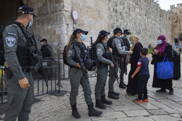 Israeli police guard one of the entrances to the Al-Aqsa Mosque in East Jerusalem.