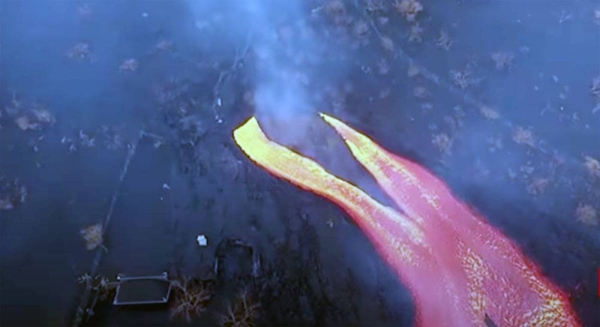 Earthquakes rattled La Palma in Spain's Canary Islands on Monday, as lava continued to flow from vents in the volcano that has been erupting since Sept. 19.